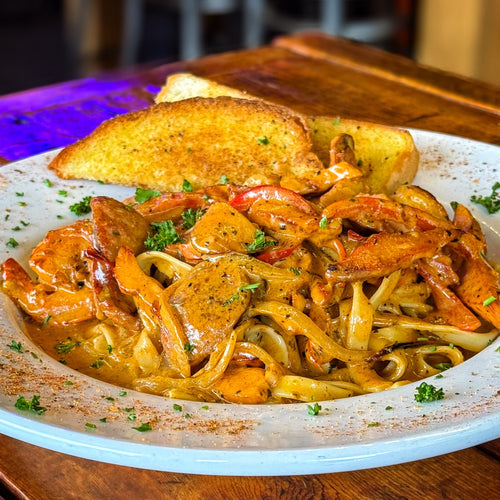 CAJUN CHICKEN & ANDOUILLE SAUSAGE PASTA  (Catered Box Lunch)